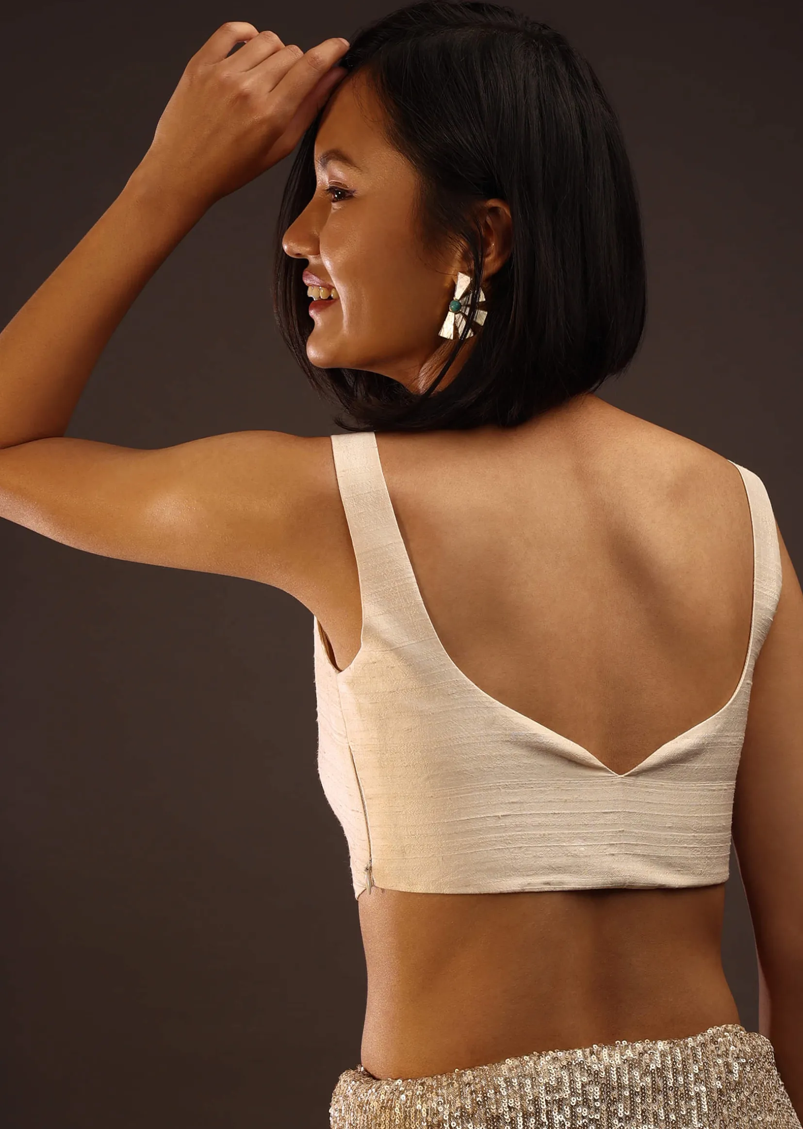 Angora White Sleeveless Blouse With A Sweetheart Neckline