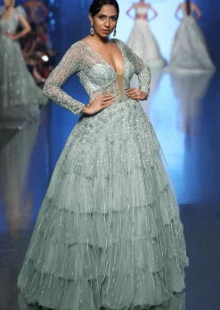 Aqua Blue Gown With Frilled Layer In Embroidered Net And Sheer Net Deep V Bodice