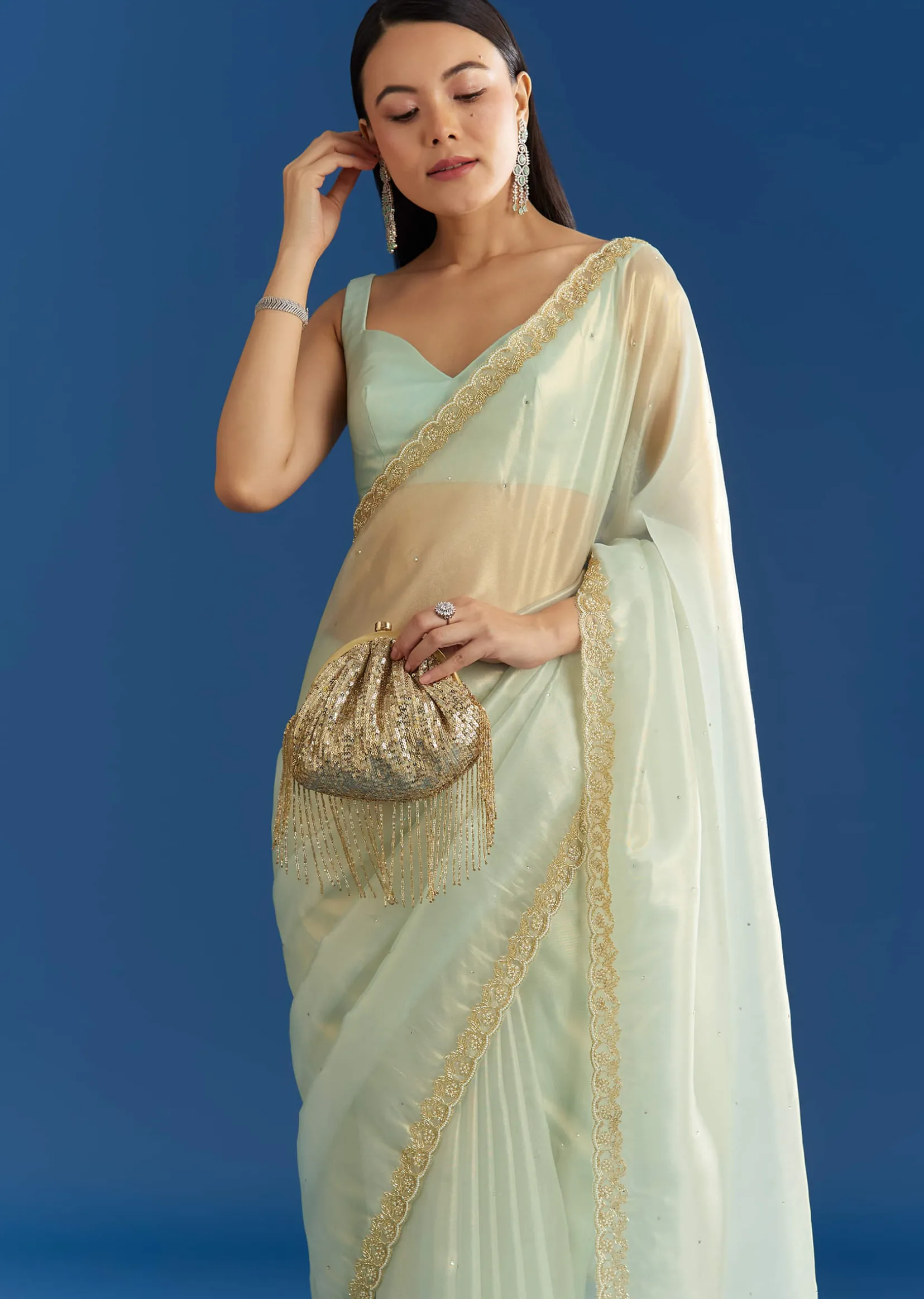 Aqua Blue Organza Tissue Embellishd Saree With Scallop Border