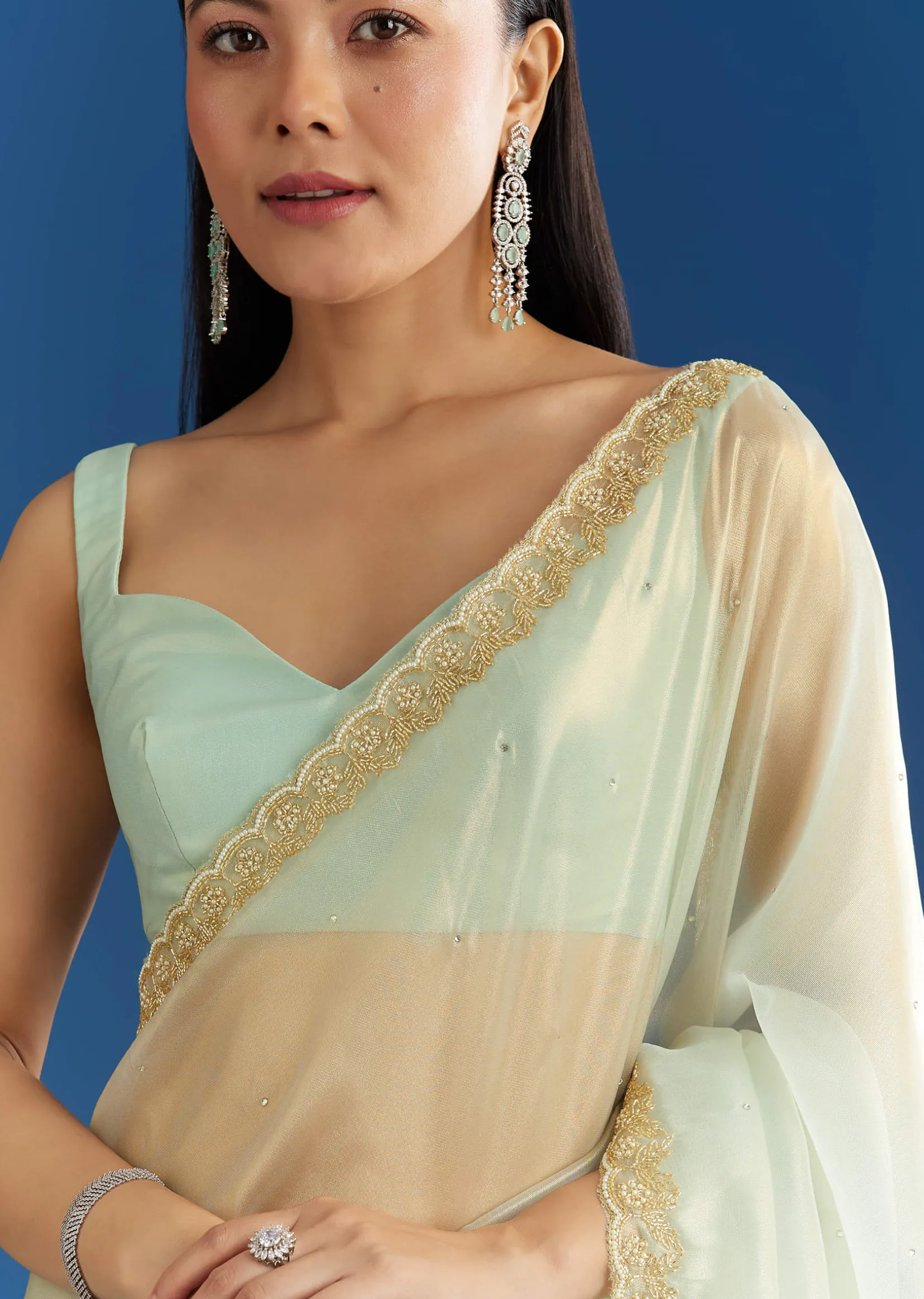 Aqua Blue Organza Tissue Embellishd Saree With Scallop Border