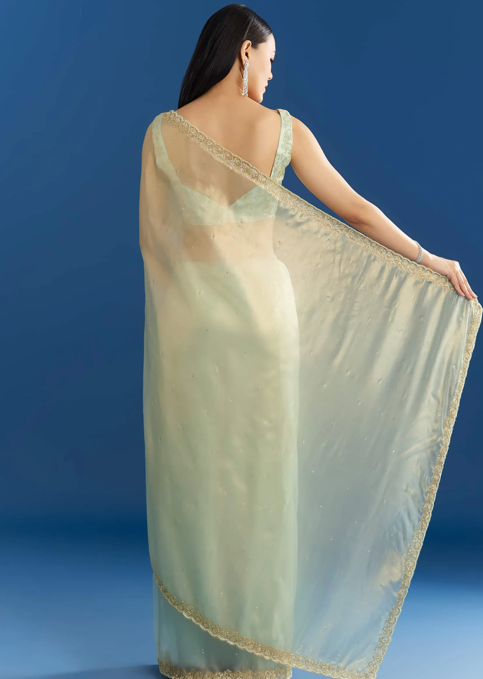 Aqua Blue Organza Tissue Embellishd Saree With Scallop Border