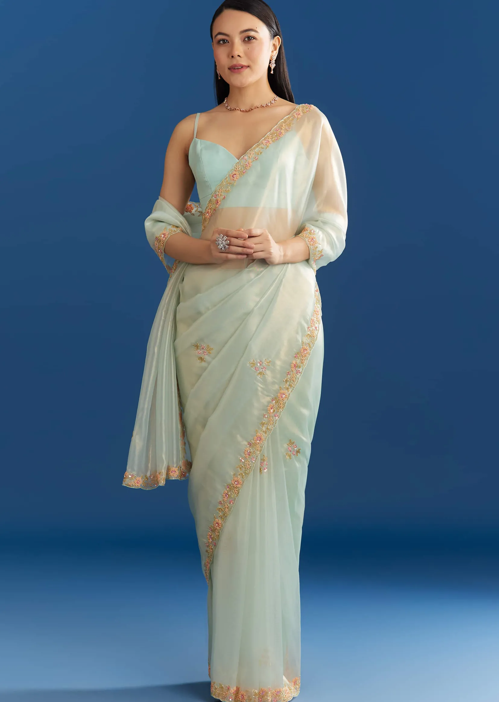 Aqua Blue Organza Tissue Saree With Multicolor Border