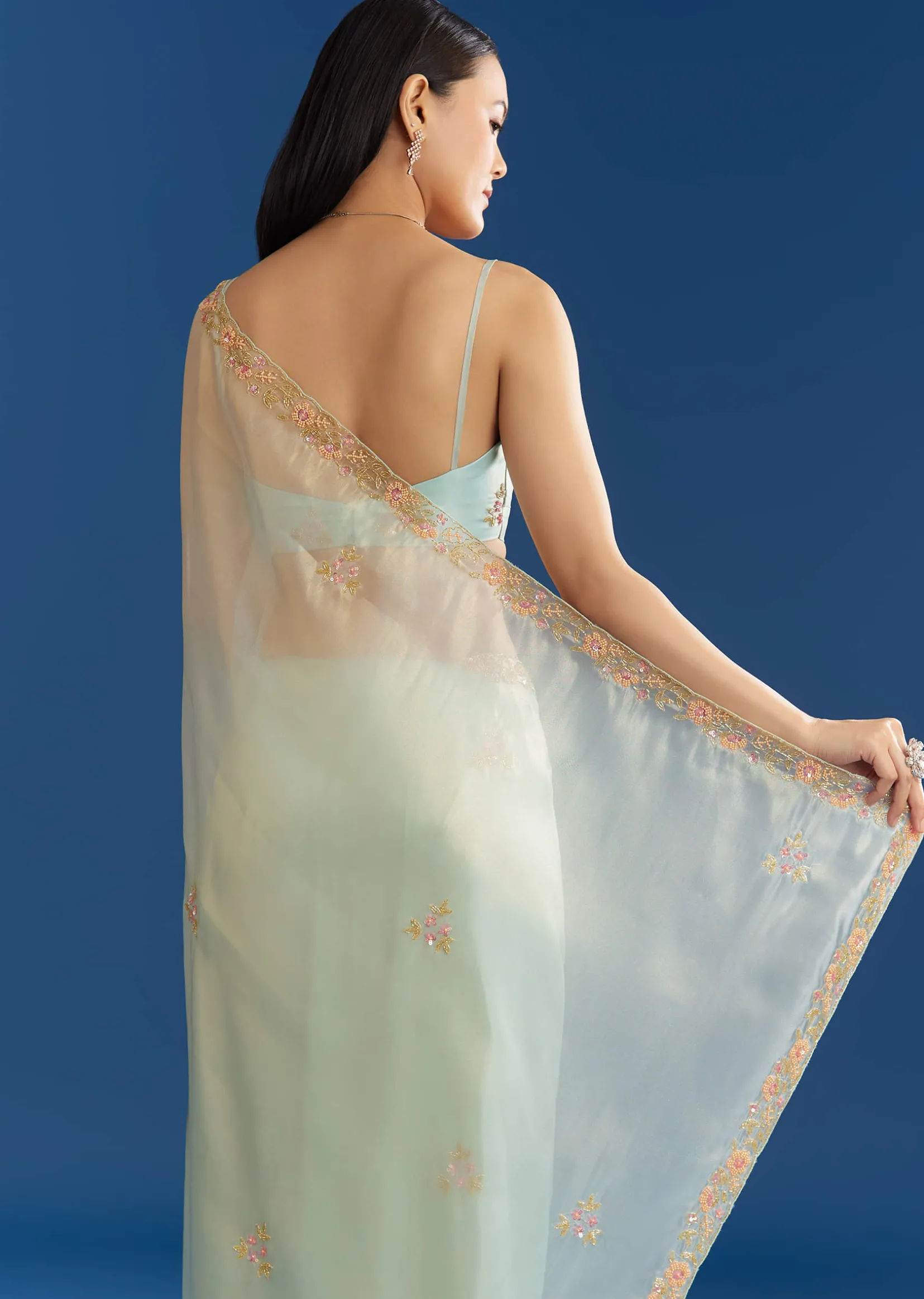 Aqua Blue Organza Tissue Saree With Multicolor Border