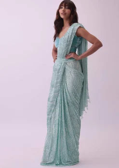 Aqua Blue Saree And Stitched Velvet Blouse With Hanging Crystals