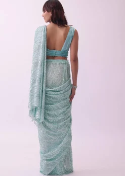 Aqua Blue Saree And Stitched Velvet Blouse With Hanging Crystals