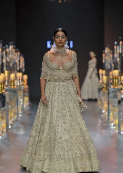 Beige Bridal Lehenga Set In Raw Silk With Corset Bodice And Heavy Embroidery