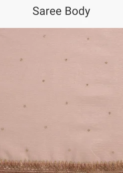 Beige Crushed Tissue Saree With Stone Embellishment And Glossy Finish