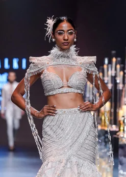 Beige Fish-Cut Lehenga And Cape Set With Crystal Tassels