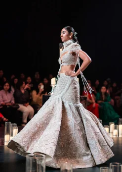 Beige Fish-Cut Lehenga And Cape Set With Crystal Tassels