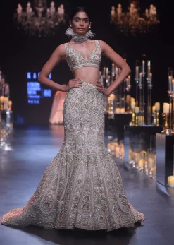 Beige Fish-Cut Trail Lehenga Set With Hand Work Pearl Embroidery And 3D Floral Motifs