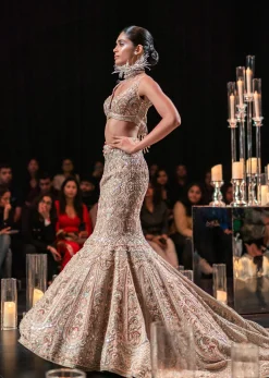 Beige Fish-Cut Trail Lehenga Set With Hand Work Pearl Embroidery And 3D Floral Motifs
