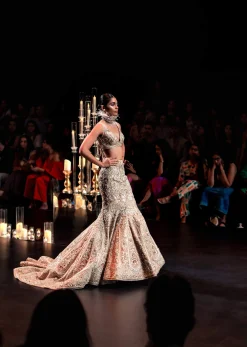 Beige Fish-Cut Trail Lehenga Set With Hand Work Pearl Embroidery And 3D Floral Motifs
