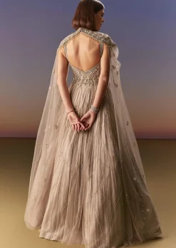 Beige Gown With Shoulder Cape And Rich Vertical Embroidery