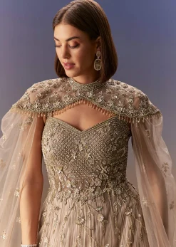 Beige Gown With Shoulder Cape And Rich Vertical Embroidery