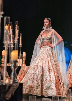 Beige Raw Silk Bridal Lehenga Set With Pearl Tassels And 3D Embroidery