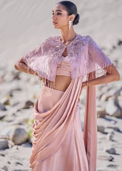 Beige Satin Draped Saree With Pleated Blouse And Embroidered Cape
