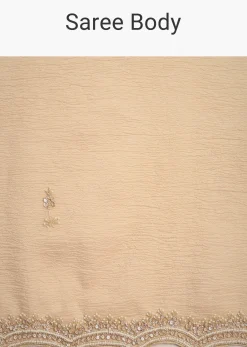 Beige Tissue Saree With Moti And Cutdana Border And Unstitched Blouse