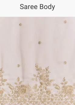 Beige Tissue Saree With Scallop Border And All Over Floral Embroidery