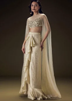 Beige Zardozi Embroidered Blouse With Brocade Drape Skirt And Net Cape