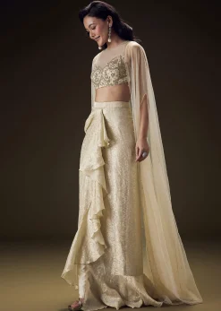 Beige Zardozi Embroidered Blouse With Brocade Drape Skirt And Net Cape