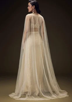 Beige Zardozi Embroidered Blouse With Brocade Drape Skirt And Net Cape