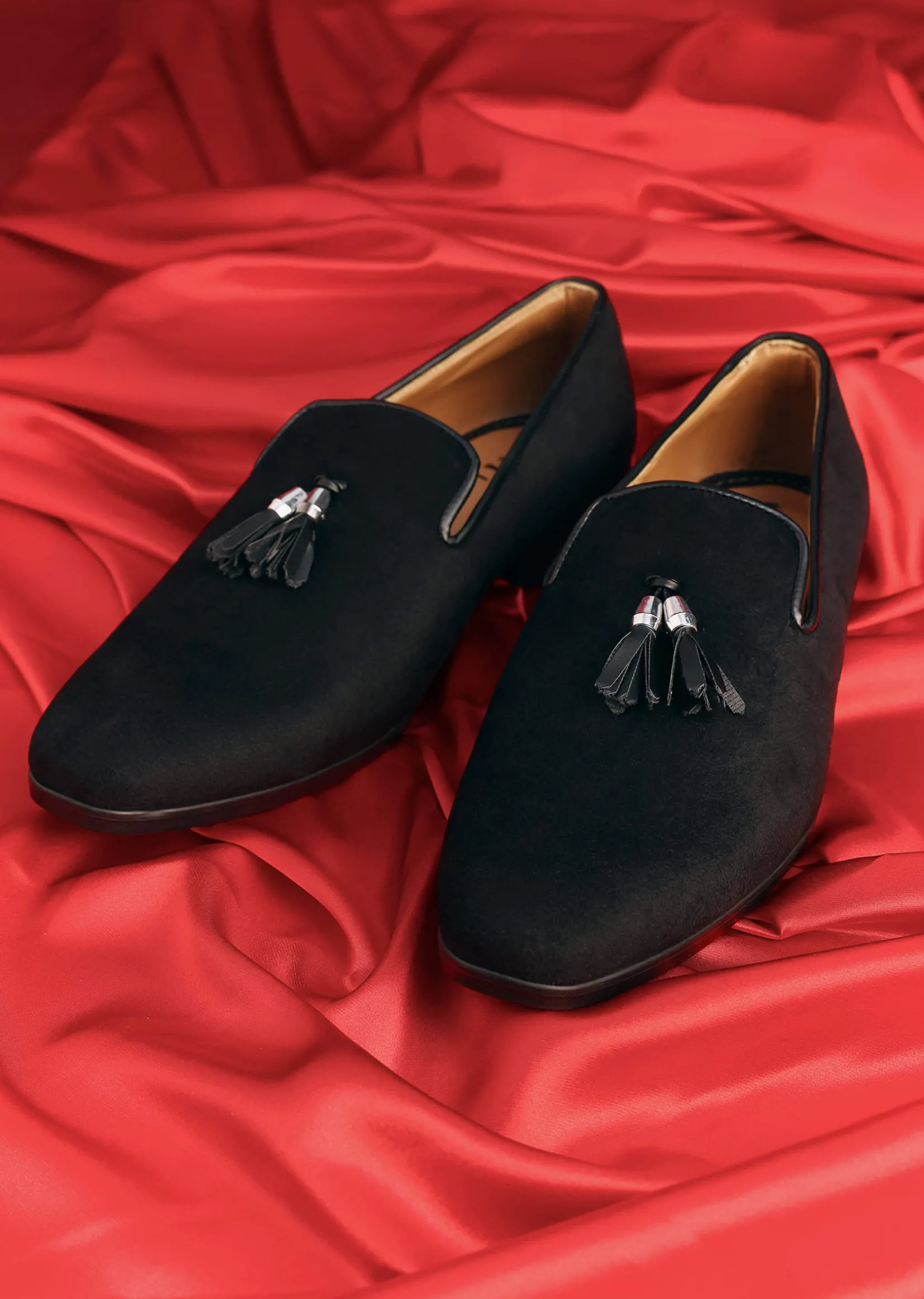 Black Juttis With Tassel Detailing