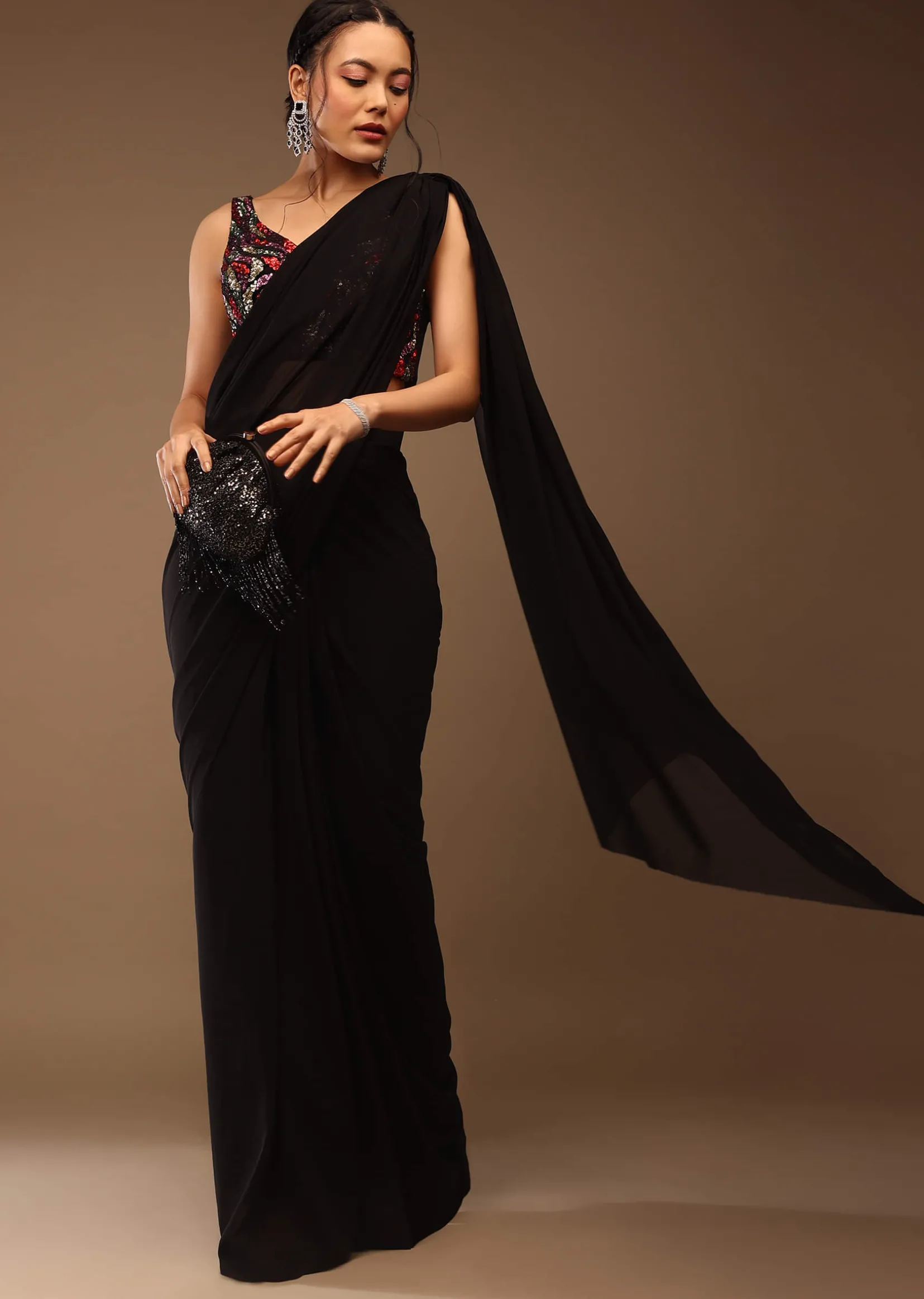 Black Saree With A Crop Top In Multi-Colored Sequins Embellishment Padded With Tie-Up Tassel Dori At The Back