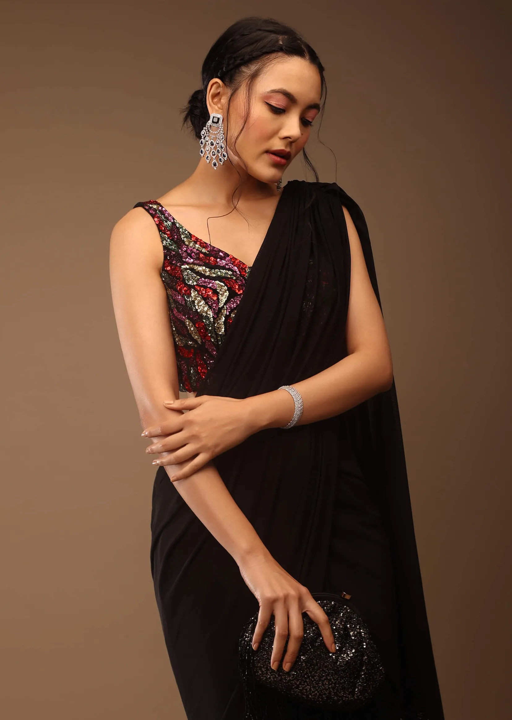 Black Saree With A Crop Top In Multi-Colored Sequins Embellishment Padded With Tie-Up Tassel Dori At The Back