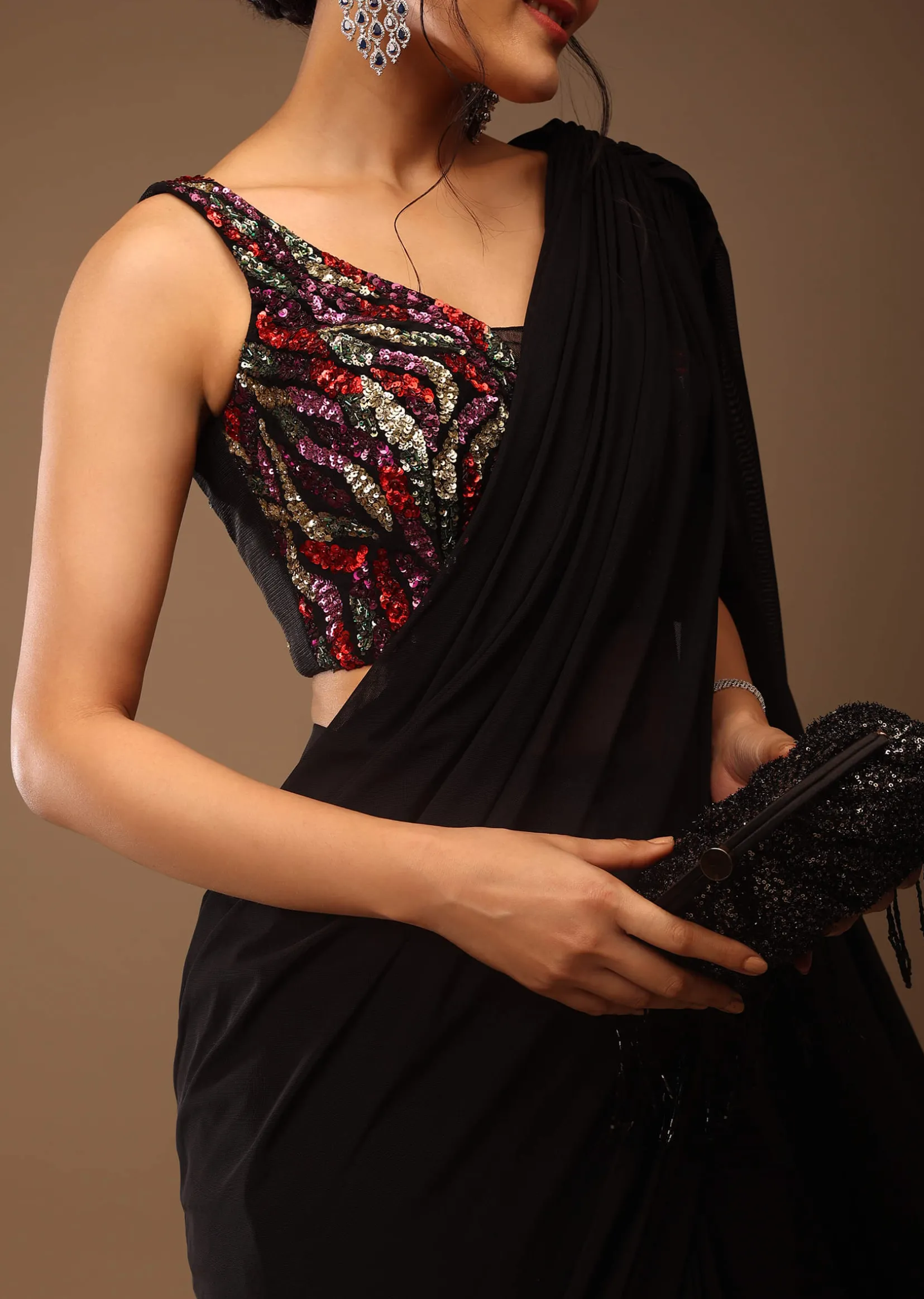 Black Saree With A Crop Top In Multi-Colored Sequins Embellishment Padded With Tie-Up Tassel Dori At The Back