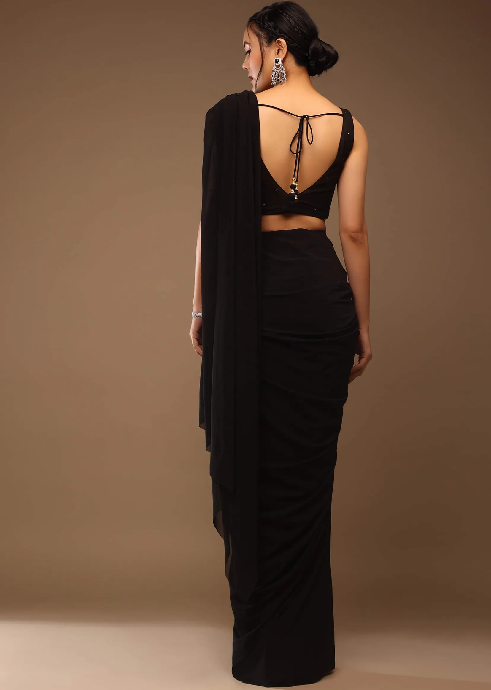Black Saree With A Crop Top In Multi-Colored Sequins Embellishment Padded With Tie-Up Tassel Dori At The Back