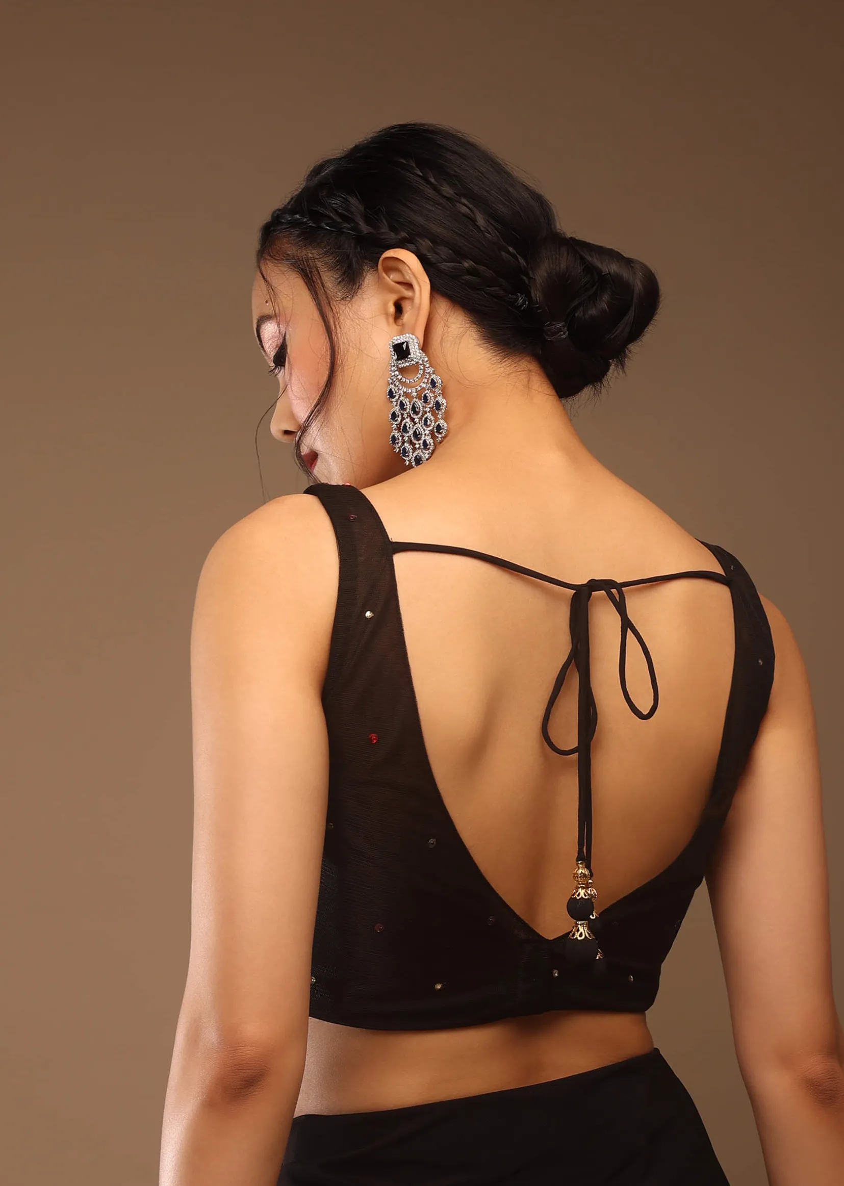 Black Saree With A Crop Top In Multi-Colored Sequins Embellishment Padded With Tie-Up Tassel Dori At The Back