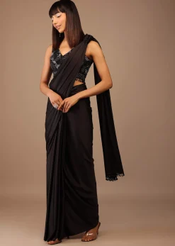 Black Satin Saree With Hand Embroidered Blouse With Fringes On The Hem