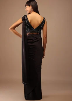 Black Satin Saree With Hand Embroidered Blouse With Fringes On The Hem