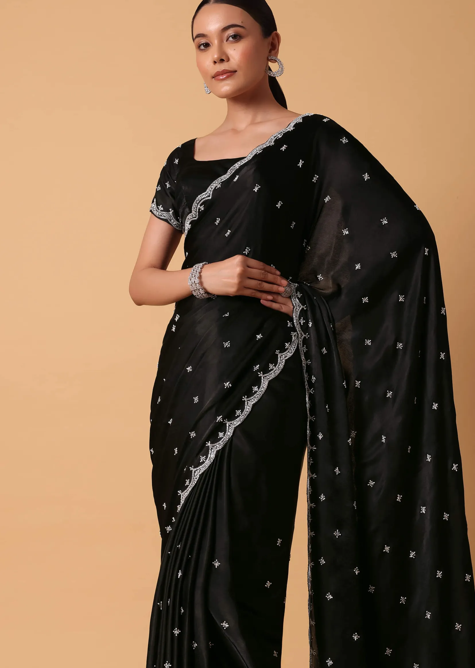 Black Satin Saree With Stone Embellishments And Unstitched Blouse Piece