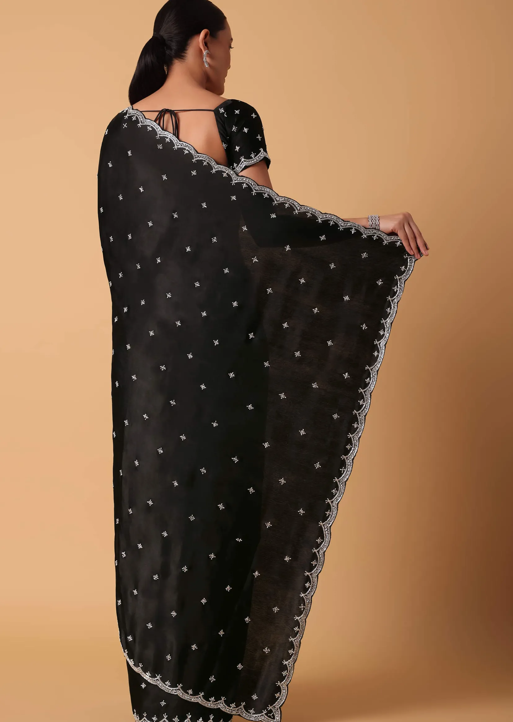 Black Satin Saree With Stone Embellishments And Unstitched Blouse Piece