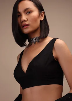Black Sleeveless Blouse In A Sweetheart Neck Line Straight Hem Line With Back Zip Closure