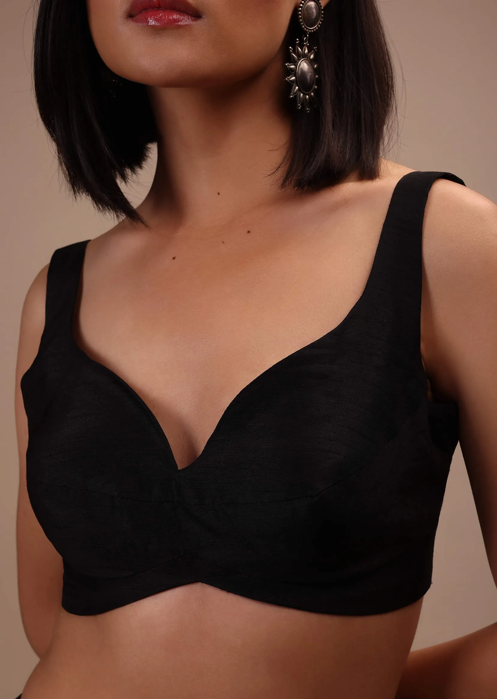 Black Sleeveless Blouse In Raw Silk With Sweetheart Neckline. Thick Strap And Adjustable Tassel Dori