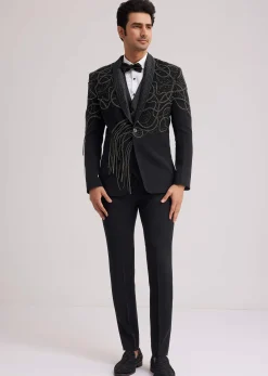 Black Suiting Tuxedo With Metallic Chain And Stone Work