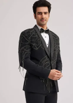 Black Suiting Tuxedo With Metallic Chain And Stone Work