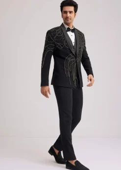 Black Suiting Tuxedo With Metallic Chain And Stone Work