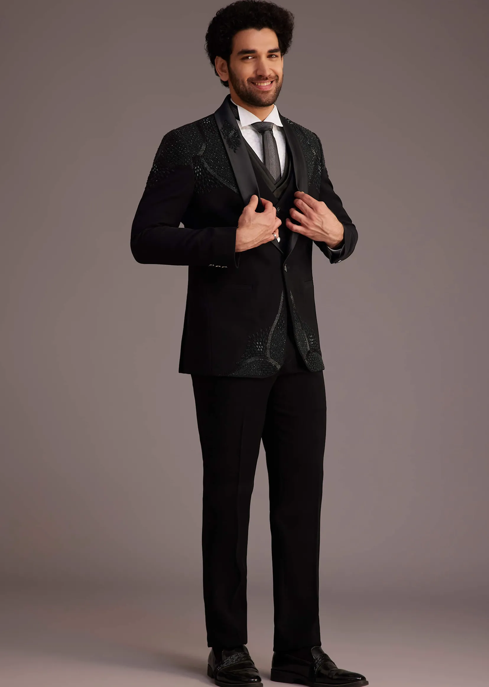 Black Tuxedo With Beaded Shoulder Detailing And Satin Lapel