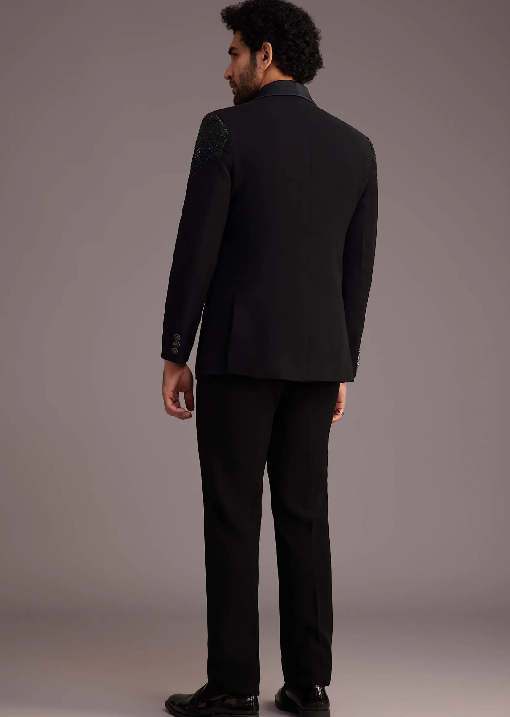 Black Tuxedo With Beaded Shoulder Detailing And Satin Lapel