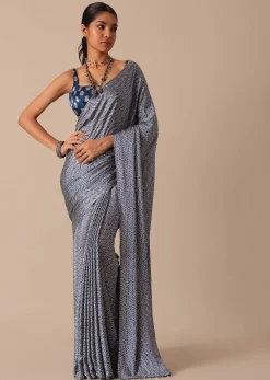 Blue Printed Saree In Satin With Tassel Detail And Unstitched Blouse Fabric