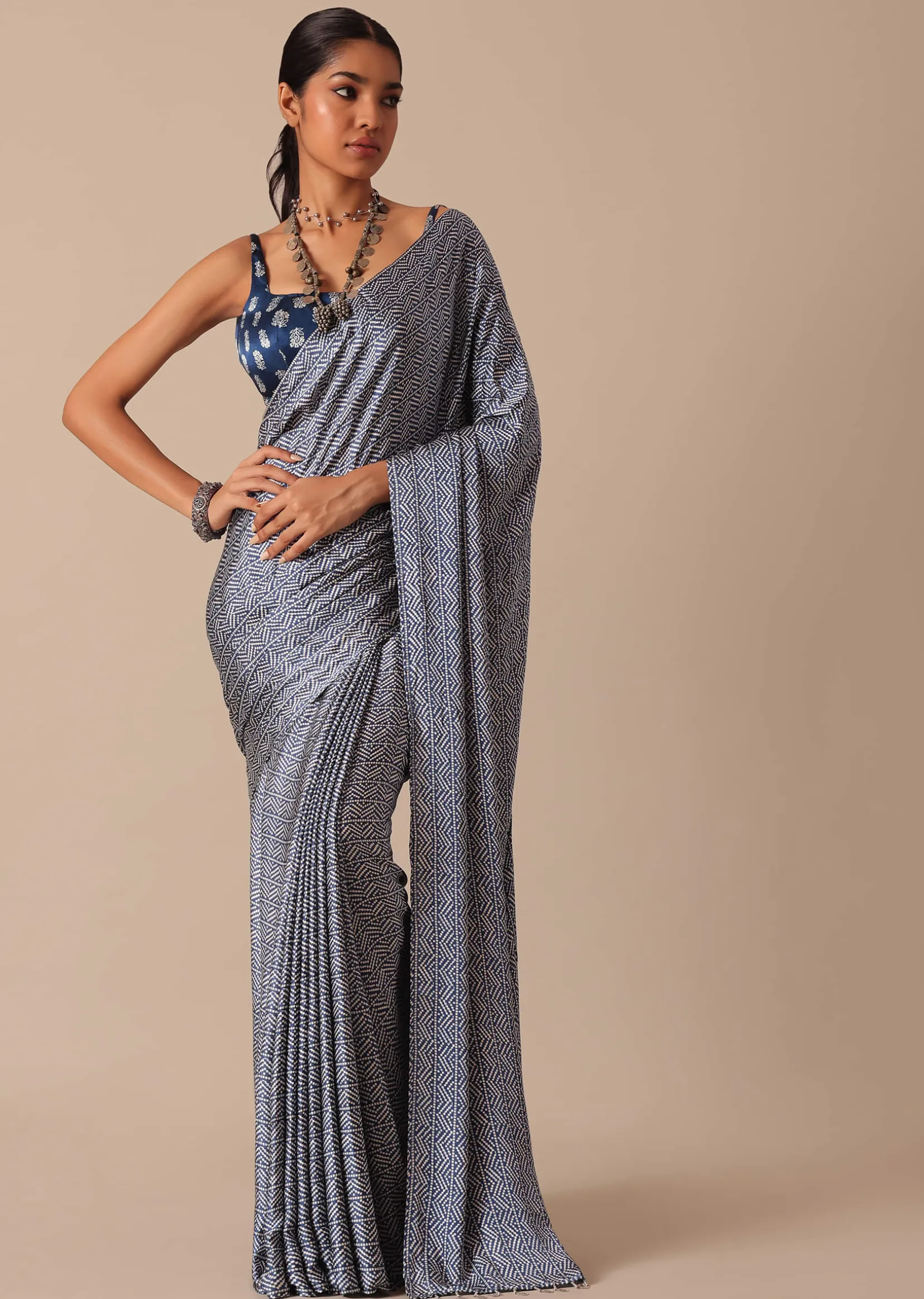 Blue Printed Saree In Satin With Tassel Detail And Unstitched Blouse Fabric
