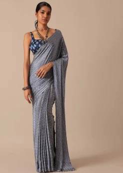 Blue Printed Saree In Satin With Tassel Detail And Unstitched Blouse Fabric