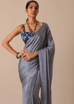Blue Printed Saree In Satin With Tassel Detail And Unstitched Blouse Fabric