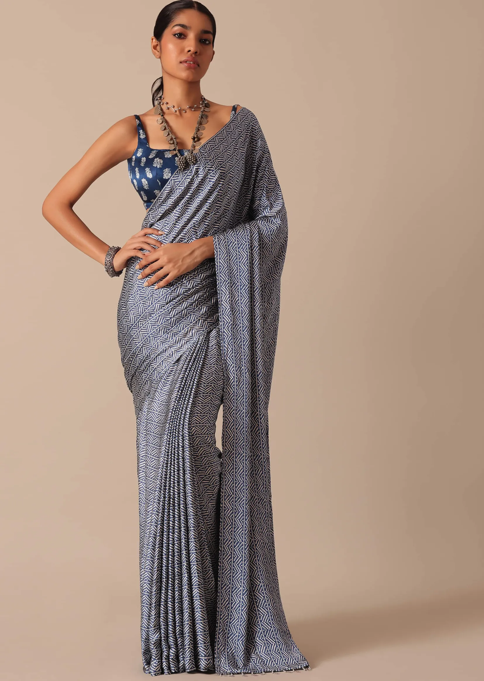 Blue Printed Saree In Satin With Tassel Detail And Unstitched Blouse Fabric