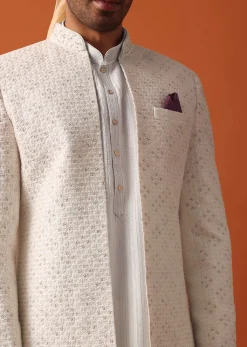 Blush Pink Sherwani Adorned with Intricate Embroidery All Over
