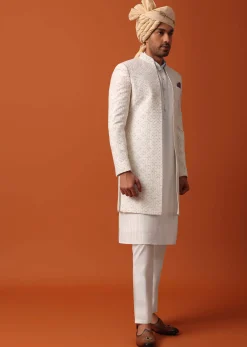 Blush Pink Sherwani Adorned with Intricate Embroidery All Over