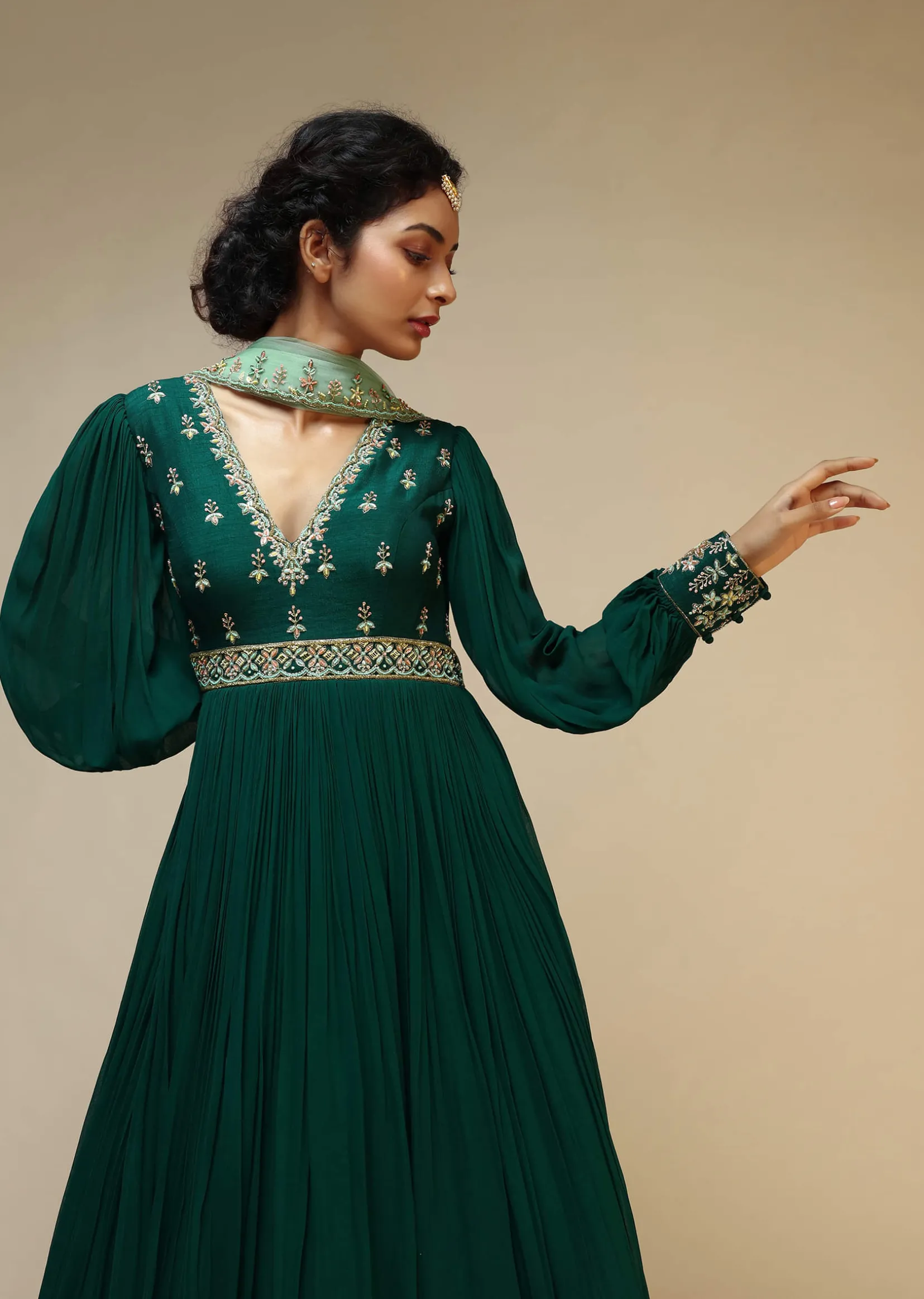 Bottle Green Anarkali Suit With Balloon Sleeves And Hand Embroidered Buttis Using Multi Colored Sequins And Beads
